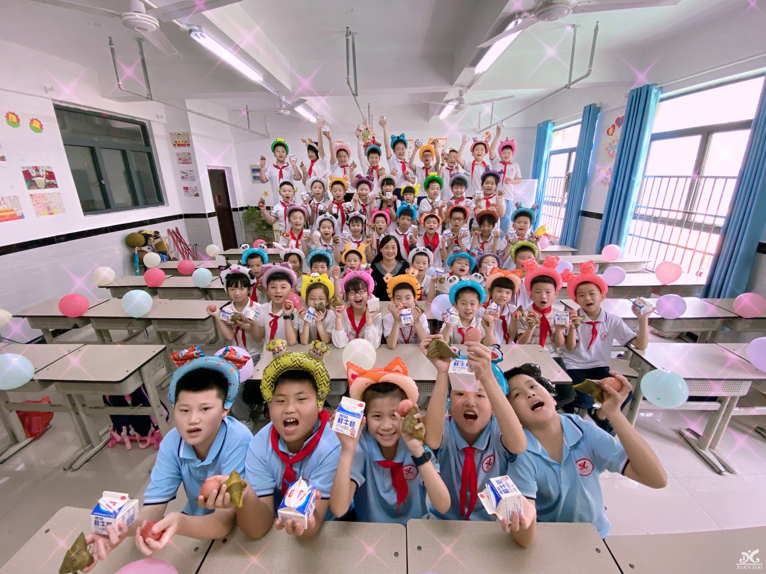 南昌現(xiàn)代外國語學(xué)校開展“歡樂六一，遇上粽香端午”慶?；顒?dòng)